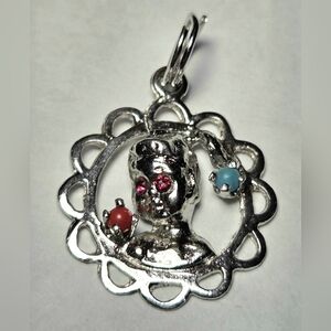 Sterling Silver Girl With Pigtail Charm with Red and Blue Accents